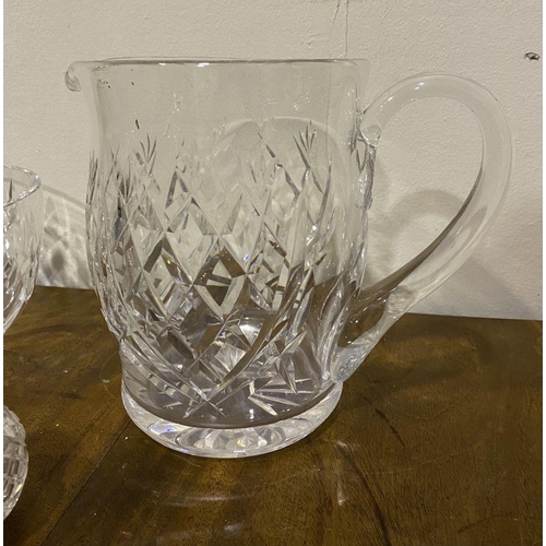 184 - A VINTAGE CUT GLASS LOT TO INCLUDE A WATERFORD CRYSTAL CUT GLASS JUG, Marked to base, (ii) a cut gla... 