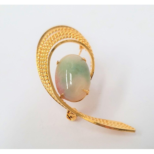 19 - A VINTAGE IRISH COSTUME BROOCH; beautiful gold tone brooch with a central set oval shaped marble sto... 