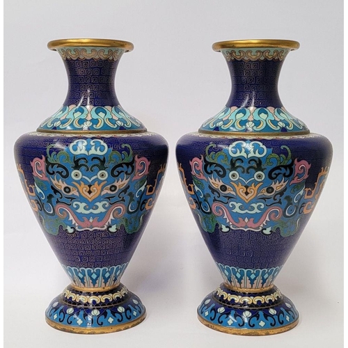 20 - A PAIR OF ANTIQUE CLOISANNE VASES, baluster form, with vibrant multicolour design on deep blue groun... 