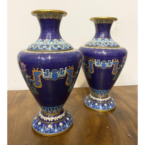 20 - A PAIR OF ANTIQUE CLOISANNE VASES, baluster form, with vibrant multicolour design on deep blue groun... 