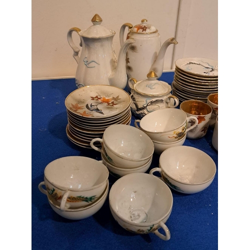 221 - A MIXED LOT OF ORIENTAL-STYLE TEA SERVICE  PIECES to include coasters, sugar prongs, tea cups, milk ... 