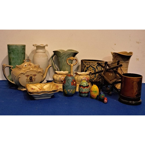 226 - A MISCELLANEOUS LOT OF HOUSEHOLD VARIETY including nesting eggs, glass and ceramic vases, teapot, wo... 