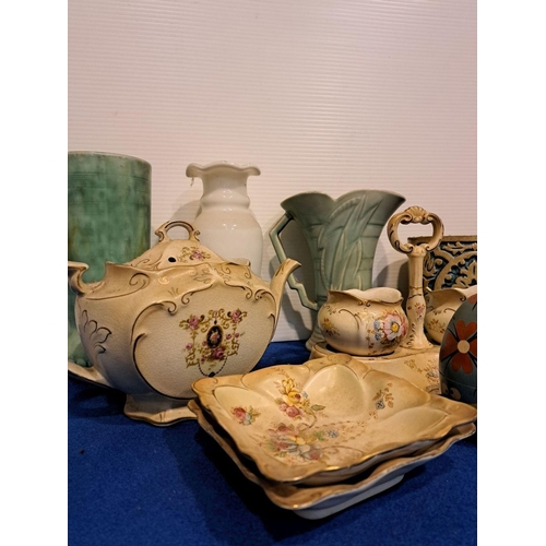 226 - A MISCELLANEOUS LOT OF HOUSEHOLD VARIETY including nesting eggs, glass and ceramic vases, teapot, wo... 