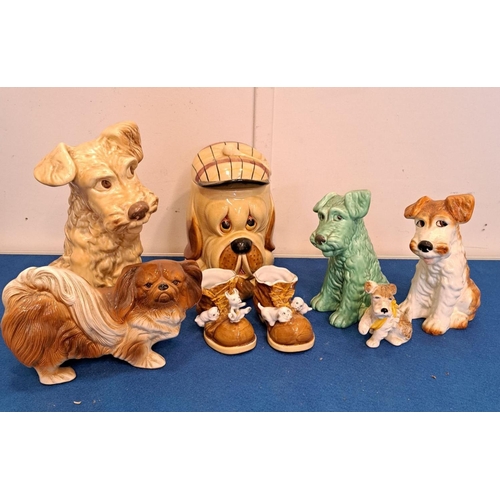 236 - A MIXED LOT INCLUDING ENGLISH CERAMIC DOGS including Sylvac piece; tallest piece 12cm.