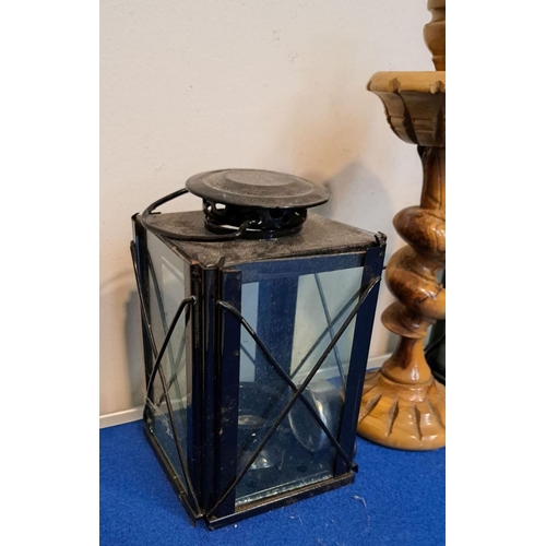 238 - A PAIR OF DIE-CAST LANTERNS ALONG WITH CANDLESTICK lanterns fittable with tealights; tallest piece 2... 