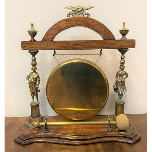 25 - AN ANTIQUE IRISH BRASS DINNER GONG, with makers plaque for ‘Purcell & Co. Stationeers Cork’, this di... 