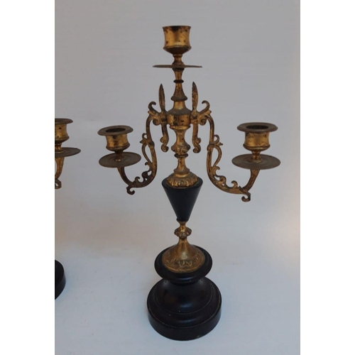 28 - A PAIR OF VICTORIAN GILT BRASS THREE BRANCH CANDLEABRA, c.1890, ornate design to candle stems, urn s... 