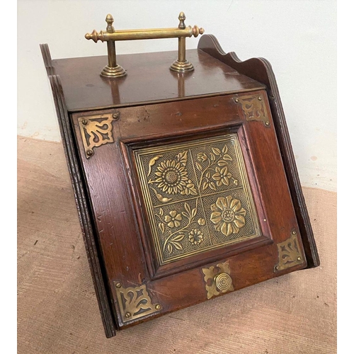 38 - A FINE MAHOGANY COAL BOX, with decorative brass panel to front, as well as brass handles