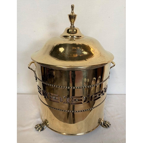 46 - A CIRCULAR BRASS COAL BOX, complete with liner and cover with finial to top, two handles, with pierc... 