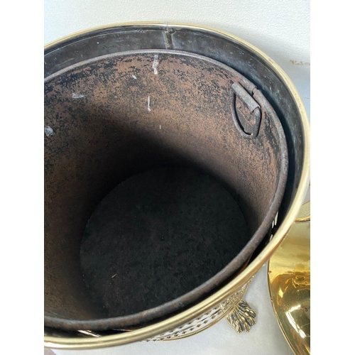 46 - A CIRCULAR BRASS COAL BOX, complete with liner and cover with finial to top, two handles, with pierc... 