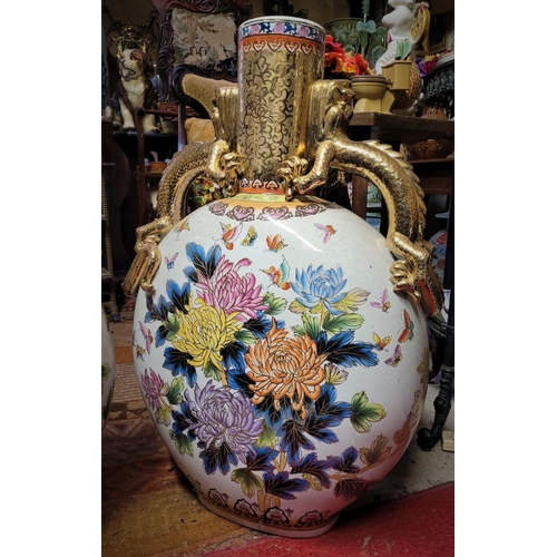 50 - A PAIR OF LARGE JAPANESE MOON FLASK VASES, each with a pair of detailed gilt dragon handles and flor... 
