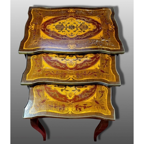 54 - A GOOD QUALITY MARQUETRY INLAID BRASS BOUND NEST OF TABLES, possibly Italian or French, each decorat... 