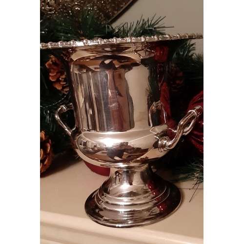 56 - A VINTAGE DECORATIVE CHAMPAGNE SILVER PLATED ICE BUCKET, urn shaped with decorative rim, two handles... 