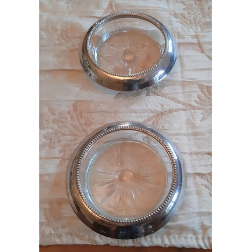 69 - A PAIR OF VINTAGE SILVER CRYSTAL WINE COASTERS, with cut glass base, in excellent condition, silver ... 