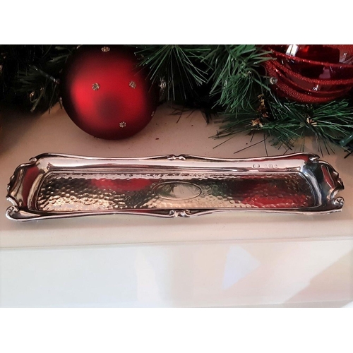 71 - A SOLID SILVER DECORATIVE DISH, Makers mark rubbed, Sheffield c.1921. Rectangular form with scrollin... 