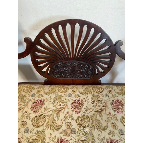 85 - A MAHOGANY FAN BACKED WINDOW SEAT, with upholstered seat, swept arms, engraved floral design to fan ... 