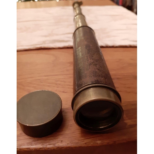 90 - A VICTORIAN NAVAL THREE DRAW NAUTICAL BRASS SCOPE, leather bound, fully intact.