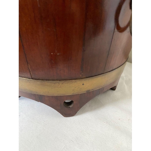 96 - AN IRISH MAHOGANY BRASS BOUND JARDINIERE, carving to top, with two brass bindings, as well as two li... 