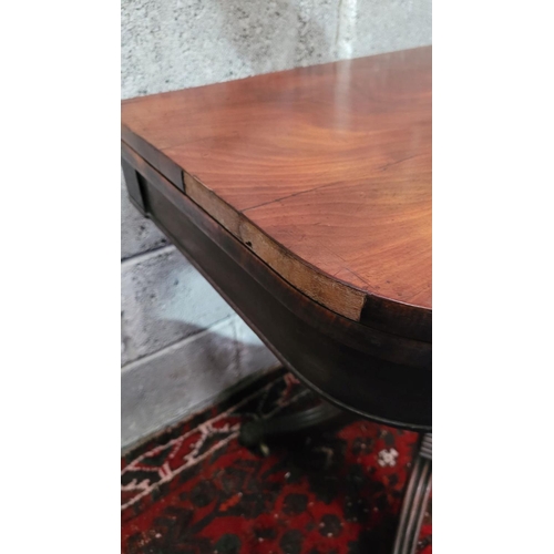 100 - A VERY GOOD QUALITY IRISH 19TH CENTURY MAHOGANY FOLD OVER CARD TABLE, the curved top turns and folds... 