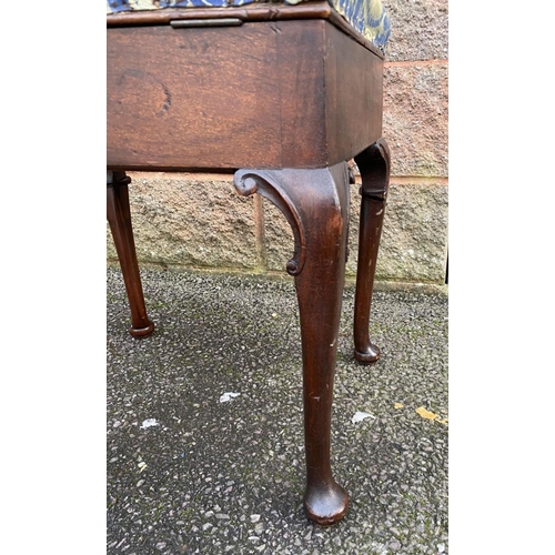 109 - AN ANTIQUE ROSEWOOD INLAID PIANO STOOL, upholstered stuff over seat, opening to interior compartment... 