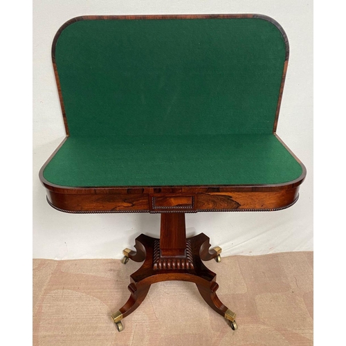 11 - A RECENCY ROSEWOOD CARD TABLE, opening to green baize lined interior, above beaded carving to frieze... 