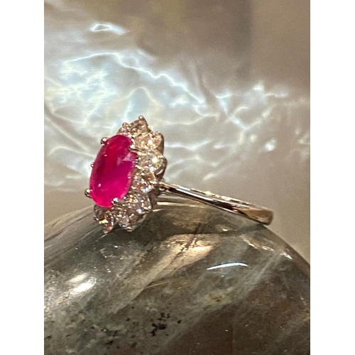 120 - A STRIKING 18CT WHITE GOLD BURMESE RUBY AND DIAMOND CLUSTER RING, diamonds in claw setting, Ruby wei... 