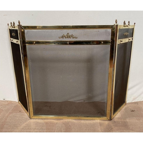 132 - A FINE BRASS THREE PANEL FIRESCREEN, with decorative finials to top, crest to centre, dimensions: 11... 