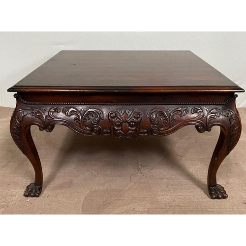 134 - A GOOD QUALITY IRISH STYLE MAHOGANY COFFEE TABLE, with beading above shaped and carved frieze, stand... 