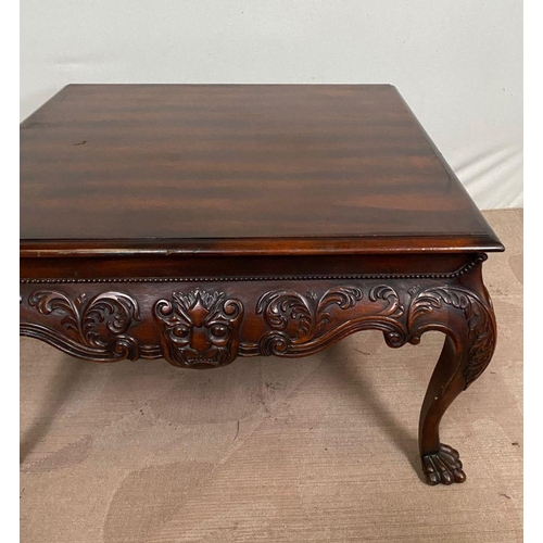 134 - A GOOD QUALITY IRISH STYLE MAHOGANY COFFEE TABLE, with beading above shaped and carved frieze, stand... 