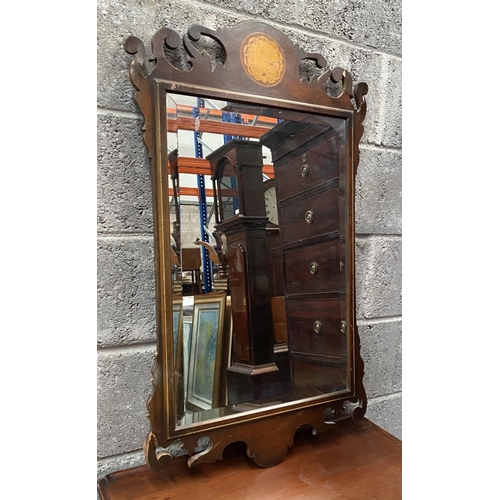 135 - A DECORATIVE MAHOGANY INLAID WALL MIRROR, of rectangular form, with bevelled glass surrounded by mol... 