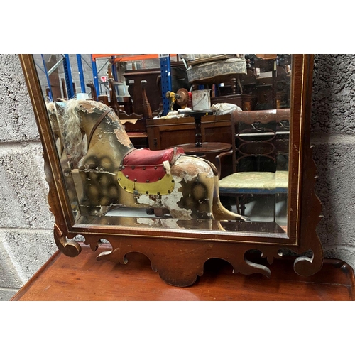 135 - A DECORATIVE MAHOGANY INLAID WALL MIRROR, of rectangular form, with bevelled glass surrounded by mol... 