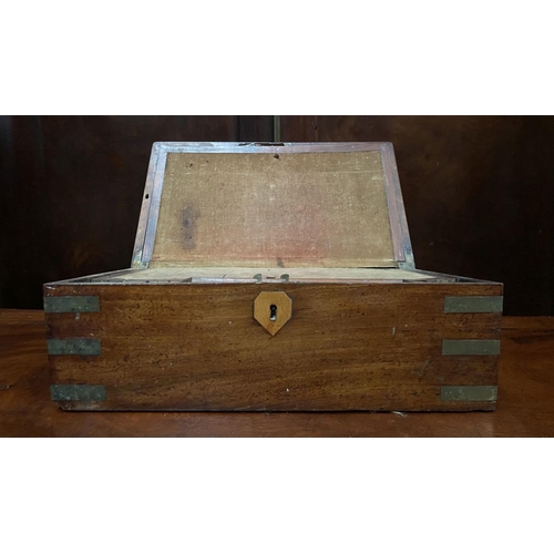 138 - A 19TH CENTURY HARDWOOD WRITING BOX, complete with brass bindings, opening to lined interior with wr... 