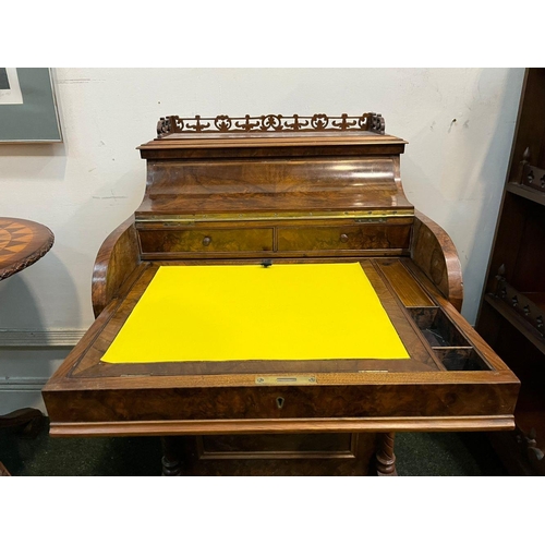 14 - A GOOD QUALITY 19TH CENTURY BURR WALNUT DAVENPORT WRITING DESK, with galleried top above shaped fron... 