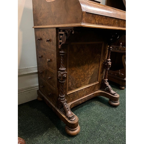 14 - A GOOD QUALITY 19TH CENTURY BURR WALNUT DAVENPORT WRITING DESK, with galleried top above shaped fron... 