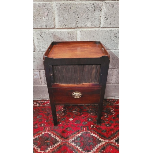 140 - A GEORGIAN TAMBOUR FRONTED WASH CABINET, the top with raised sides having a pierced handle on the le... 