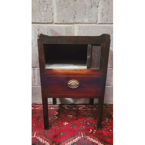 140 - A GEORGIAN TAMBOUR FRONTED WASH CABINET, the top with raised sides having a pierced handle on the le... 