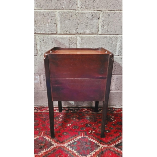 140 - A GEORGIAN TAMBOUR FRONTED WASH CABINET, the top with raised sides having a pierced handle on the le... 