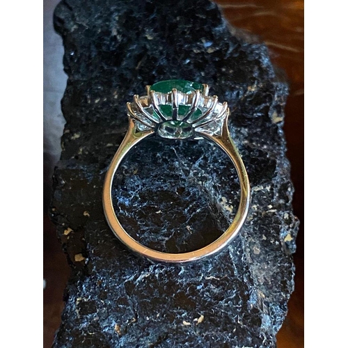 15 - AN EXQUISITE 18CT WHITE GOLD COLUMBIAN EMERALD & DIAMOND CLUSTER RING, natural oval Columbian emeral... 