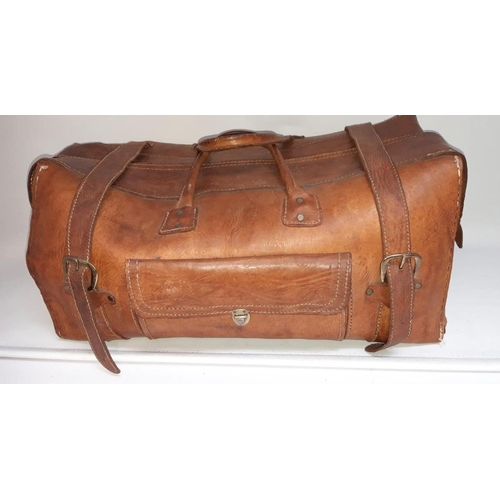 157 - A VINTAGE FRENCH BROWN LEATHER TRAVEL BAG, with multiple storage compartments. Dimensions: 60cm long... 