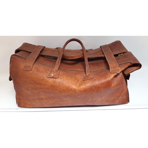 157 - A VINTAGE FRENCH BROWN LEATHER TRAVEL BAG, with multiple storage compartments. Dimensions: 60cm long... 