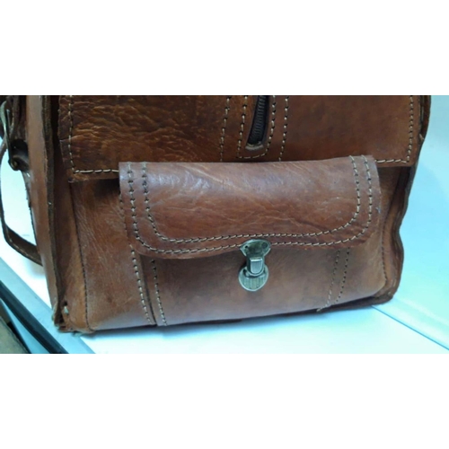 157 - A VINTAGE FRENCH BROWN LEATHER TRAVEL BAG, with multiple storage compartments. Dimensions: 60cm long... 