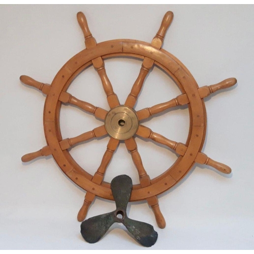 159 - A LARGE WOODEN SHIPS WHEEL, along with an antique bronze propeller. Dimensions: wheel: 92cm diameter... 