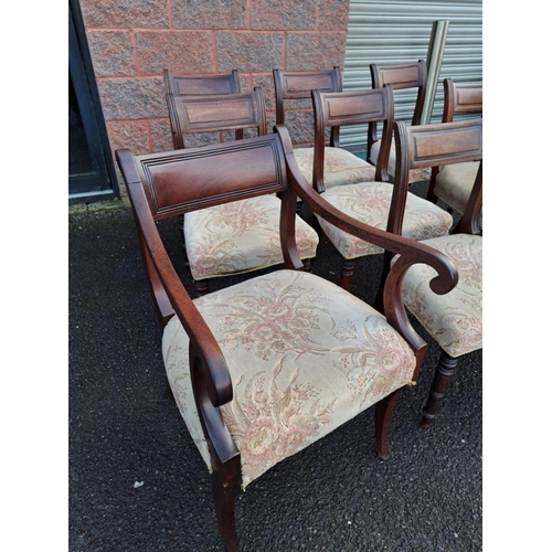 179 - A SET OF MAHOGANY DINING CHAIRS ALONG WITH TWO CARVERS, with engraved headrest, upholstered seat, sc... 