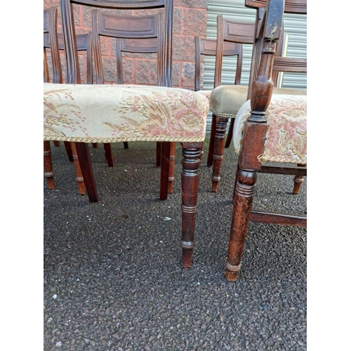 179 - A SET OF MAHOGANY DINING CHAIRS ALONG WITH TWO CARVERS, with engraved headrest, upholstered seat, sc... 