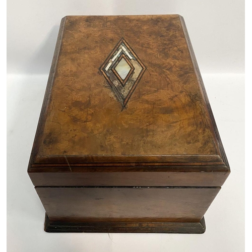 180 - A 19TH CENTURY BURR WALNUT MOTHER OF PEARL INLAID TEA CADDY, with unusual diamond form central inlay... 