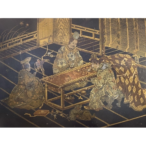 181 - A JAPANESE LAQUERED WRITING BOX, the wooden box is lacquered and decorated with depiction of three f... 