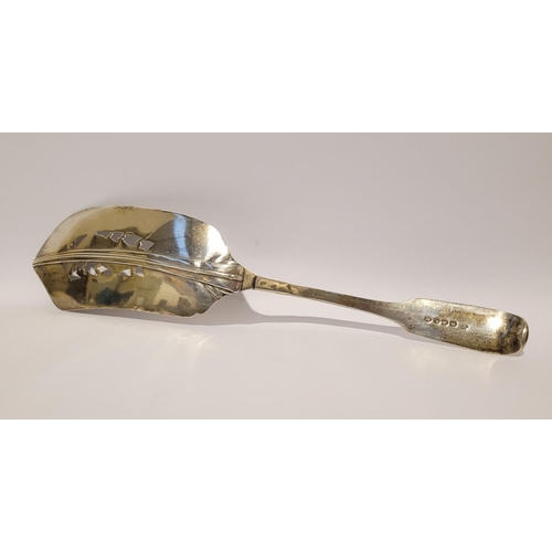 21 - A VERY EARLY 19TH CENTURY ORNATE SOLID SILVER FISH SLICE, the head of the slice is pierced and decor... 