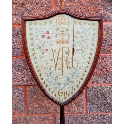 232 - A VICTORIAN POLE FIRE SCREEN, the shield shaped screen with detailed embroidery picture with inset g... 