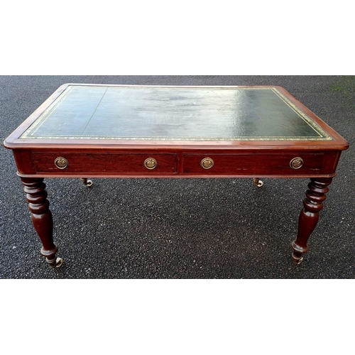 27 - A VERY GOOD QUALITY 19TH CENTURY MAHOGANY TOOLED LEATHER TOPPED WRITING DESK, the desk top with roun... 