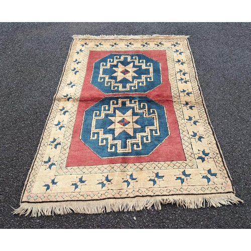 30 - A TRADITIONAL TURKISH ‘KARS’ FLOOR RUG, with double medallion design to the centre, having main grou... 